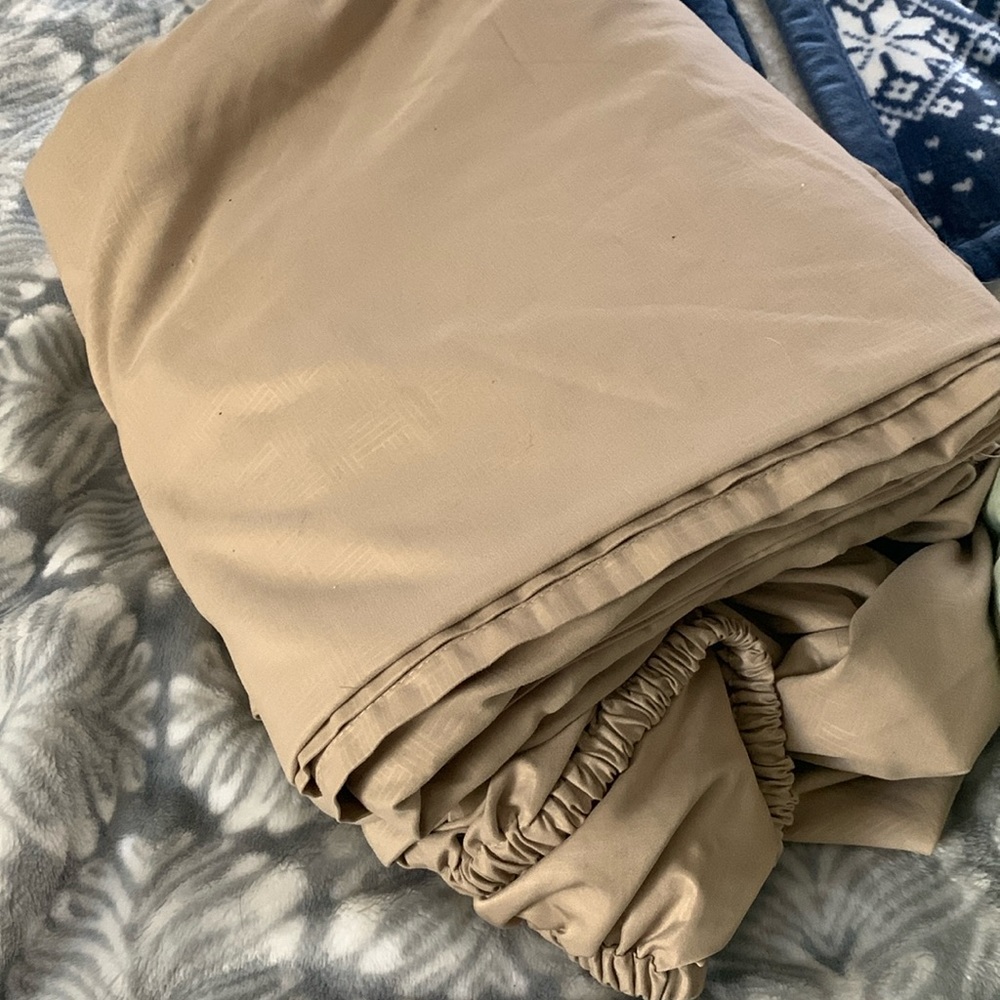 Full sheet set.  Size full.  Tan. In very good condition